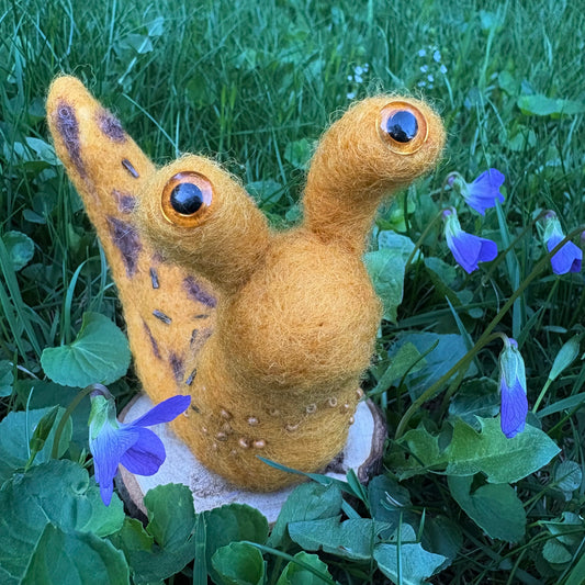 Felted Banana Slug Wool Sculpture on Wood Disc